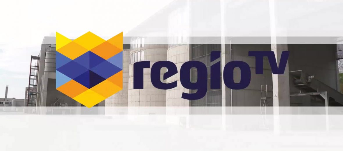 Regio-TV-Logo vor Holzgaskraftwerk in Senden